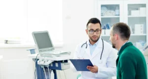 View of a doctor talking with a patient